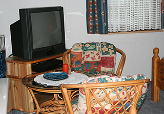 Doppelzimmer mit TV und Sitzecke